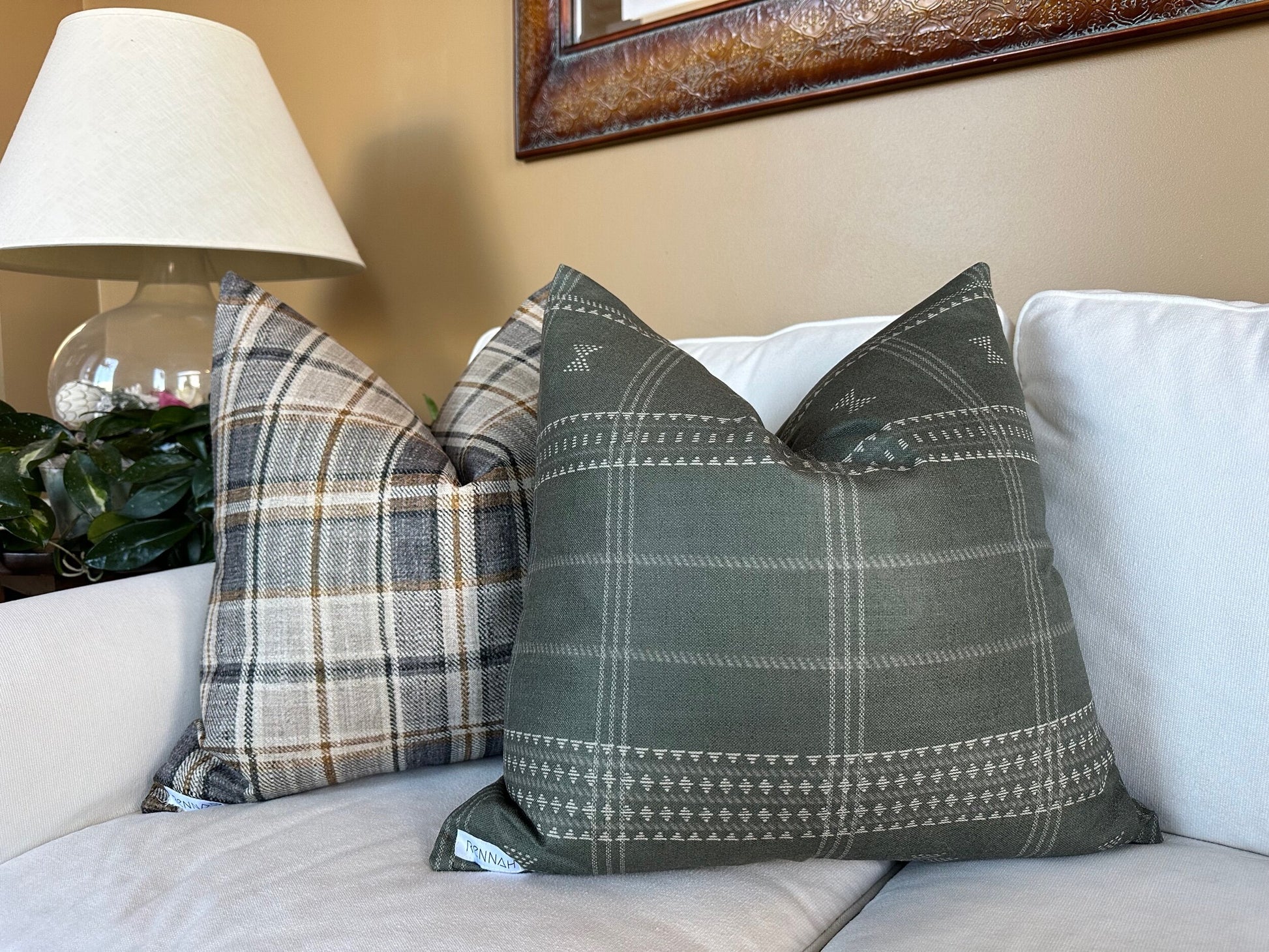 Plaid pillow in charcoal, tan, and cream with polyester-linen fabric